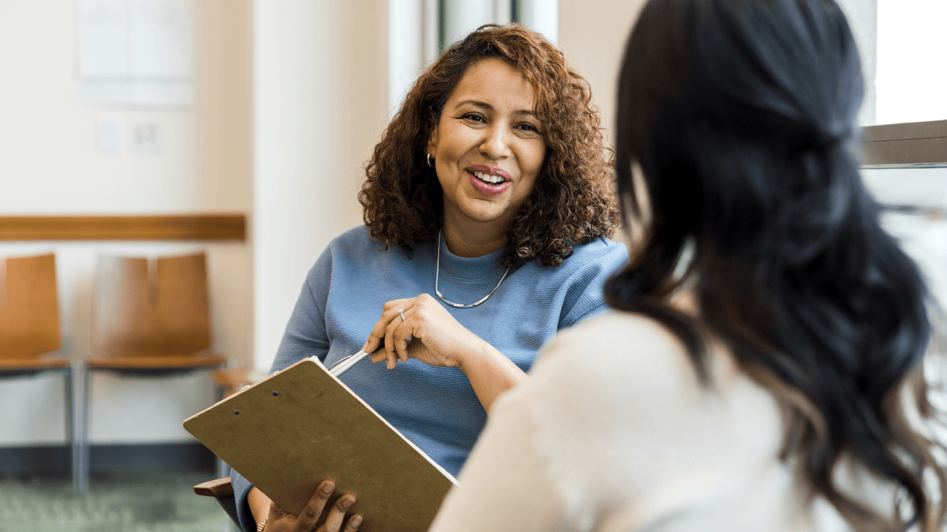 professional woman meeting with a higher-up